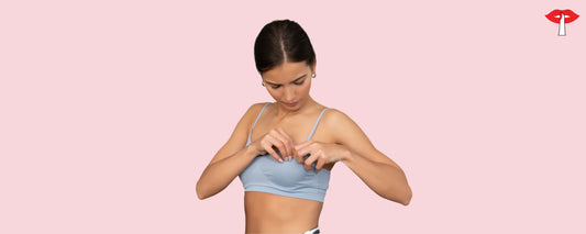 Wrong bra size shown by a woman adjusting her bra to check fit and support issues