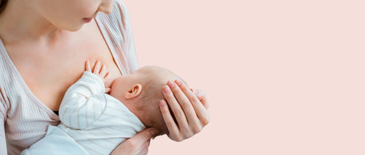 Mother breastfeeding her newborn while wearing a comfortable nursing bra - Best Nursing Bras Online On Gossip Store By Mybra 