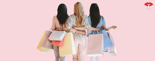 Women holding shopping bags to represent bra shopping and choosing the right bra for comfort and fit