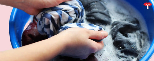 Hand Washing delicate lingerie in water as part of essential lingerie care tips to maintain fabric and elasticity 