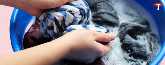Hand Washing delicate lingerie in water as part of essential lingerie care tips to maintain fabric and elasticity 