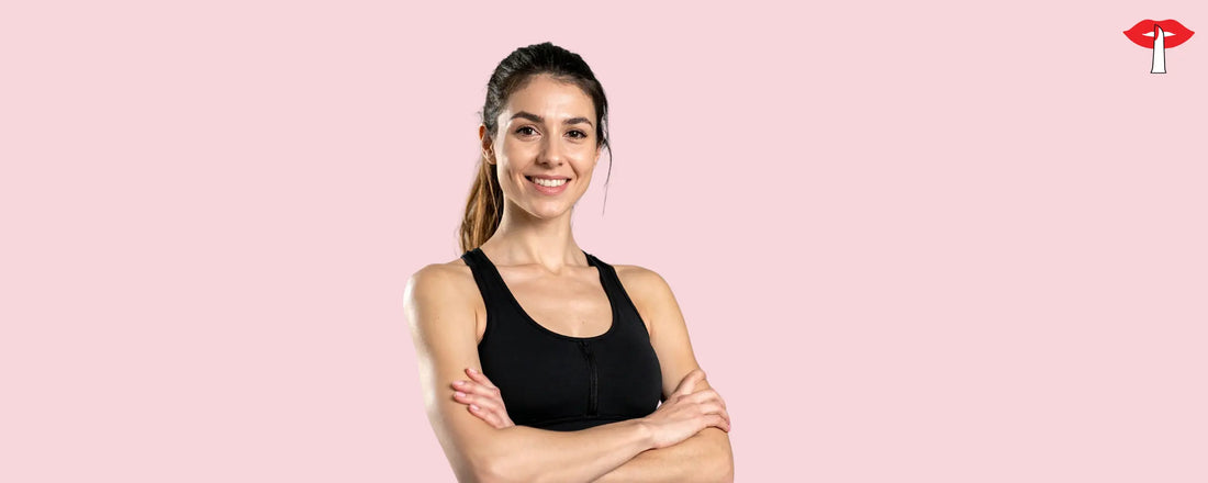 Woman wearing a black sports bra - supportive activewear for women in India by Gossip Store, designed to reduce pain and improve comfort during workouts